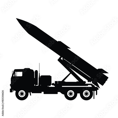 Silhouette of a missile launcher truck with a rocket ready to fire