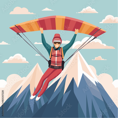 Hang glider soaring over snowy mountains