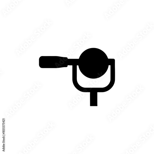 Black silhouette of a vintage hand crank drill on a white background