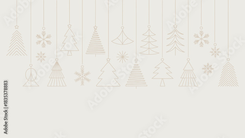 Delicate pastel christmas ornaments and snowflakes hang from thin threads against a soft light background creating a festive and elegant holiday decoration concept