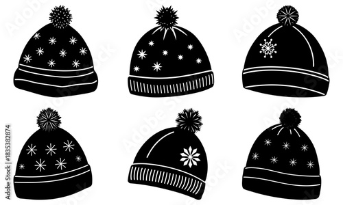Collection of six black winter hats with pom poms and various snowflake and star designs on a white background