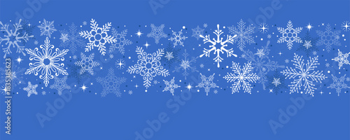 Blue Winter Snowflake Banner. White decorative snowflakes and sparkling stars on blue background, perfect for Christmas cards, holiday designs, posters, banners and web.