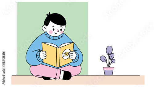 Boy engrossed in reading a book while sitting cross-legged, accompanied by a potted plant.