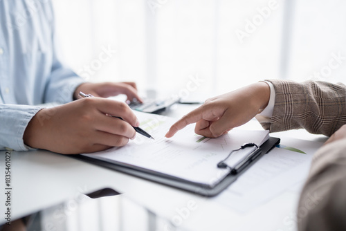 Fotografija business man Auditor or internal revenue service staff checking annual financial statements company Audit  Accounting tax
