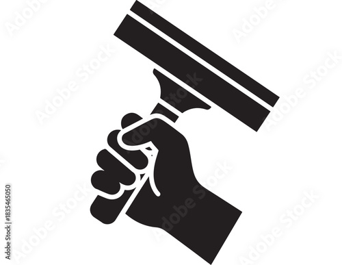 Strong hand firmly grips a squeegee tool ready for professional window cleaning or surface smoothing tasks