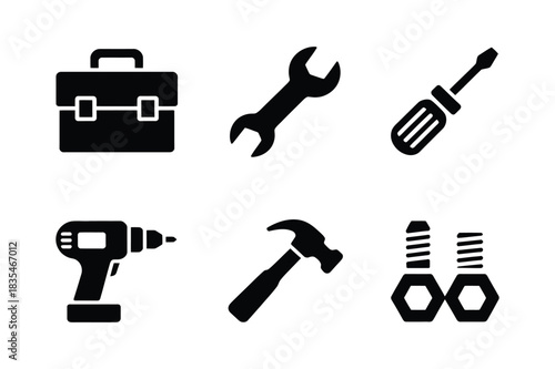 Collection of black silhouetted hand tools and toolbox icons
