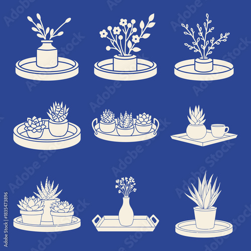 Solid filled decorative tray icon set featuring candle holder dried flowers and succulents on a blue background for design projects