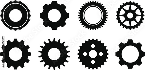Set of black gear wheels isolated on white background