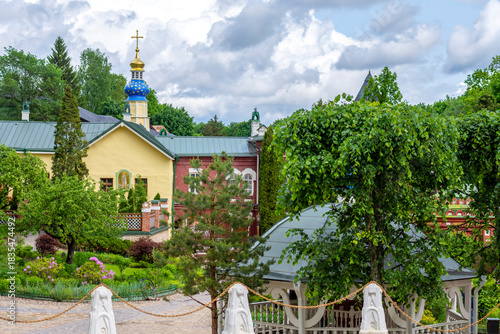 Pechory, Pskov Region, Russia - June 20, 2025: On the territory of the Pechora Holy Dormition Pskovo-Pechersky Monastery. Pskov region, religion Christianity history