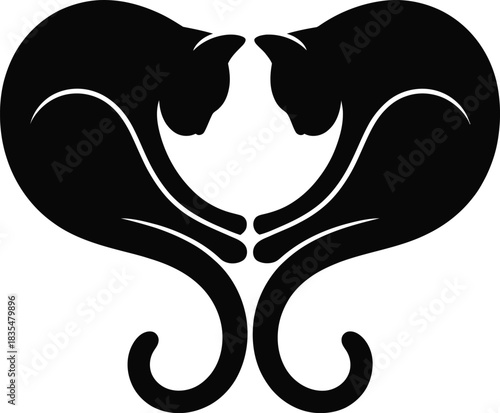 Two black cats forming a heart shape silhouette
