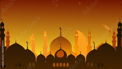 Silhouette of mosques against a fiery sunset sky