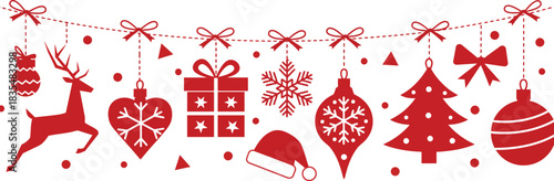 Festive red christmas ornaments and decorations including a reindeer tree gifts snowflakes baubles and bows strung on a garland against a white background