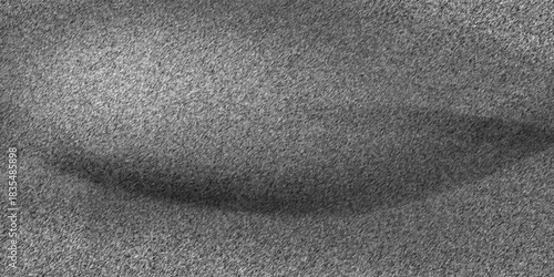 A close-up shot of black fabric with soft, wavy texture.