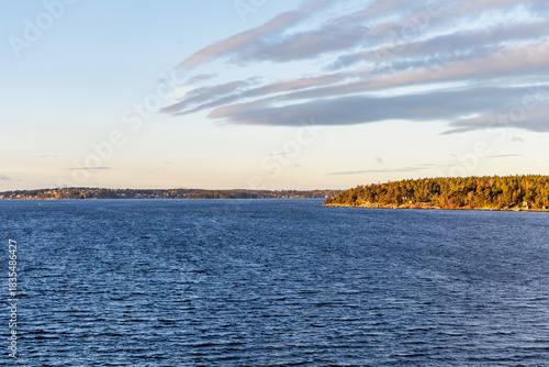 Vast Open Water and Distant Forested Horizon