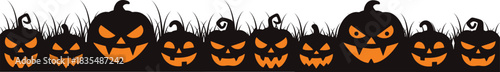 Spooky Halloween background scary pumpkin silhouette with orange glowing eyes and mouth on black grass with transparent background with copyspace