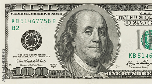 Macro image of a hundred-dollar bill, part of the bill