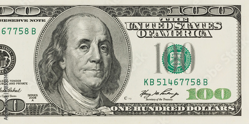 A picture of a part of a 100 bill. It's the American money. It's a banknote with one hundred dollars on it. It's for economics and finance