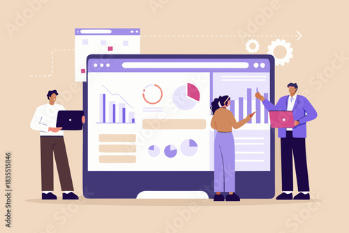 Business team analyzing data and charts on a large computer screen