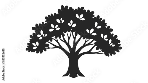 A silhouette image of a bushy tree with white leaves
