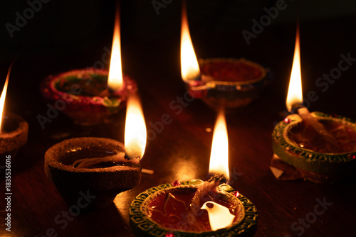 Portrait view of Karthigai deepam colorful oil lamp, a bright lights in the night