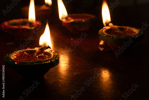 Portrait view of Karthigai deepam colorful oil lamp, a bright lights in the night