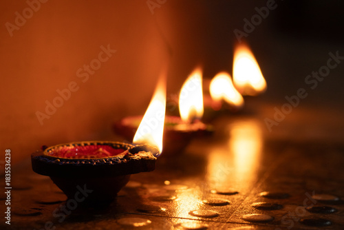 Row of colorful oil lamp prepared for the celebration of Karthigai deepam in Tamil nadu