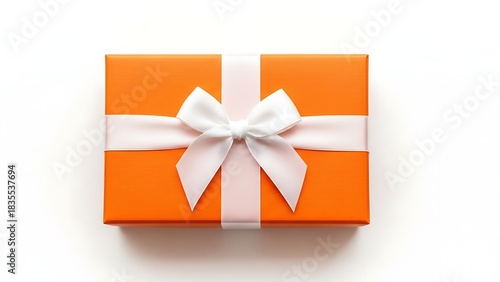 Bright orange gift box with a white satin ribbon and bow on a white background