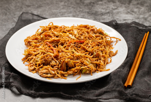 Chicken, pepper, and vegetables noodles on plate
