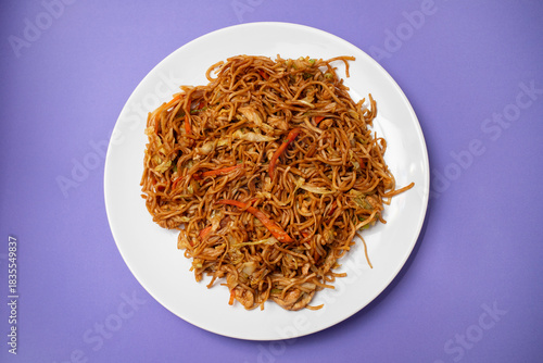 Chicken, pepper, and vegetables noodles on plate