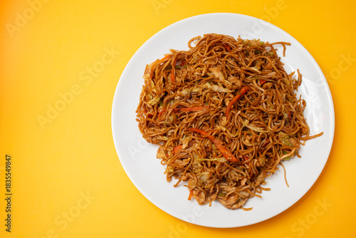 Chicken, pepper, and vegetables noodles on plate