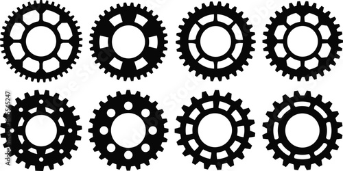 Set of eight different black industrial mechanical engineering gear wheel and cog silhouettes for technology and machinery isolated on white