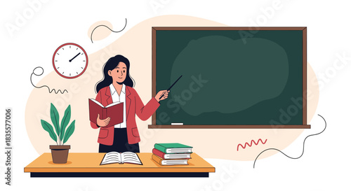 Female teacher standing in a classroom at her desk, pointing to a blank chalkboard with books and a plant nearby.