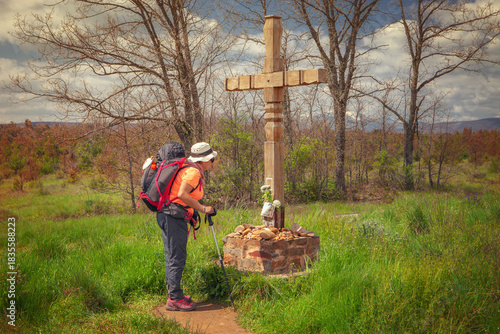 Pilgrim and crosses on the way of st james, full of symbology, Spain