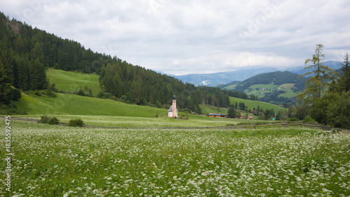 Landscape with the small church of San Giovanni in the Funes Valley in the heart of the Dolomites in South Tyrol.