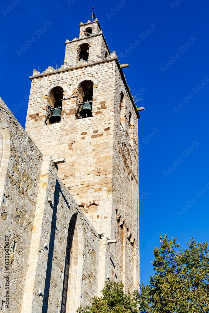 Fototapeta premium Bell tower of the Monastery of Sant Cugat (Catalan: Monestir de Sant Cugat,a Benedictine abbey in Sant Cugat del Vallès, Catalonia, Spain, Europe