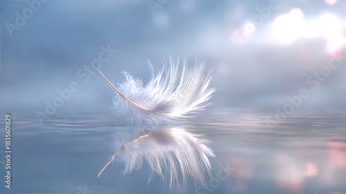 A soft feather drifts on a serene water surface, mirroring gentle pastel colors, creating a peaceful ambiance, symbolizing tranquility and the essence of Cloud Dancer color of year 2026. Copy space