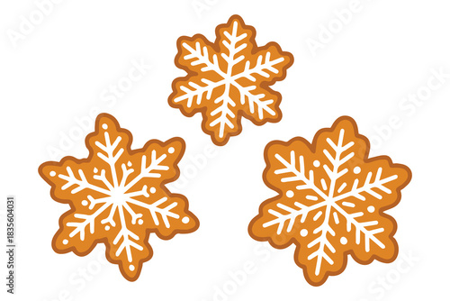 Set of star-shaped holiday biscuits. Baked gingerbread snowflakes with detailed white glaze frosting isolated for Christmas design and winter menu.