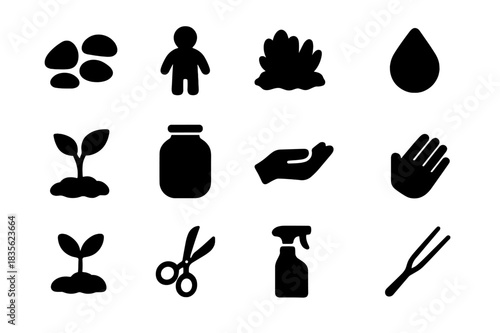 Terrarium Icon Set. Terrarium decoration. Solid icon set of Terrarium decoration: decorative stones, miniature figurine, moss, pebbles, small plant, glass jar,