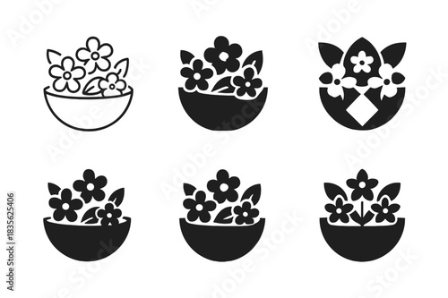 Edible Flower Logos. Cooking with edible flowers. Icon set. Set Logo of cooking with edible flowers: salad with edible blooms. harmonious logo variations of