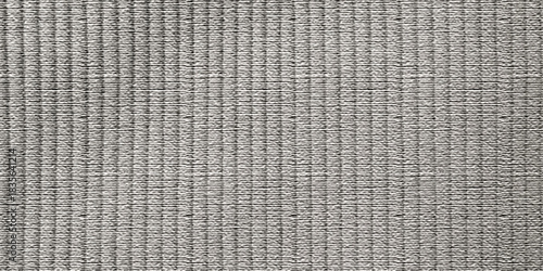 Gray fabric texture, a woven textile pattern with rough, natural fibers creating a subtle canvas backdrop