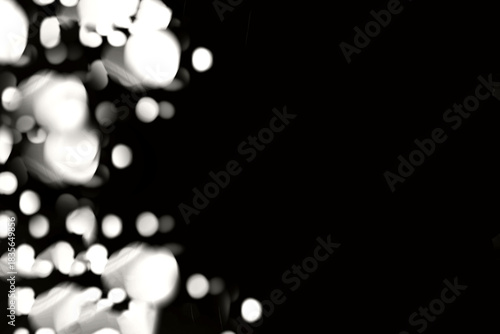 Blurry garland lights on a dark background. Festive Christmas and New Year background. Soft focus. Image toned in color of the year 2026 - Cloud Dancer.