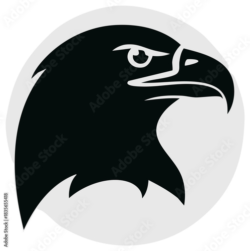 Striking silhouette of a powerful eagle head, symbolizing strength and freedom, isolated on a simple circular background.