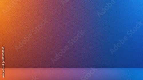 Vibrant gradient light on textured wall-floor surface orange, purple, blue hues