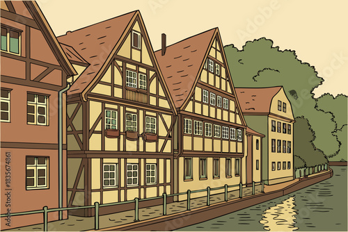 Old timber-framed houses and riverboats in Strasbourg, France.