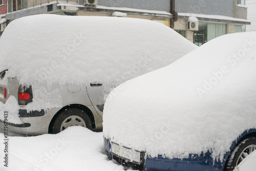 Vehicles Completely Covered By Heavy Snow During Winter Storm
