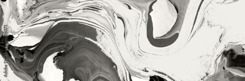 Abstract black and white marble ink texture. Modern fluid art painting with grey liquid swirls. Elegant creative background for design.