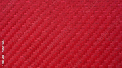 The anti-slip film is red.Red carbon fiber.Carbon fiber sports background.