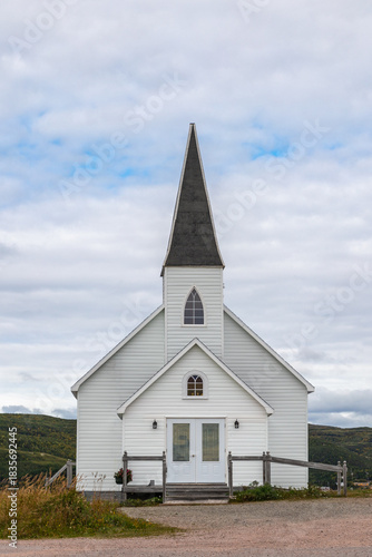 A Small White Church with Steeple in Red Bay, Newfoundland Canada on a Chilly Autumn Day