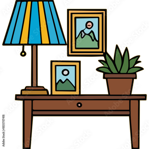 A rustic wooden table displaying a striped lampshade a potted plant and two framed landscape paintings against a black background creating a cozy home decor scene