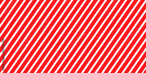 Striped candy cane seamless pattern for Christmas or New Year decoration, red and white diagonal stripes background, Xmas gift wrap, winter holiday present wrapping paper